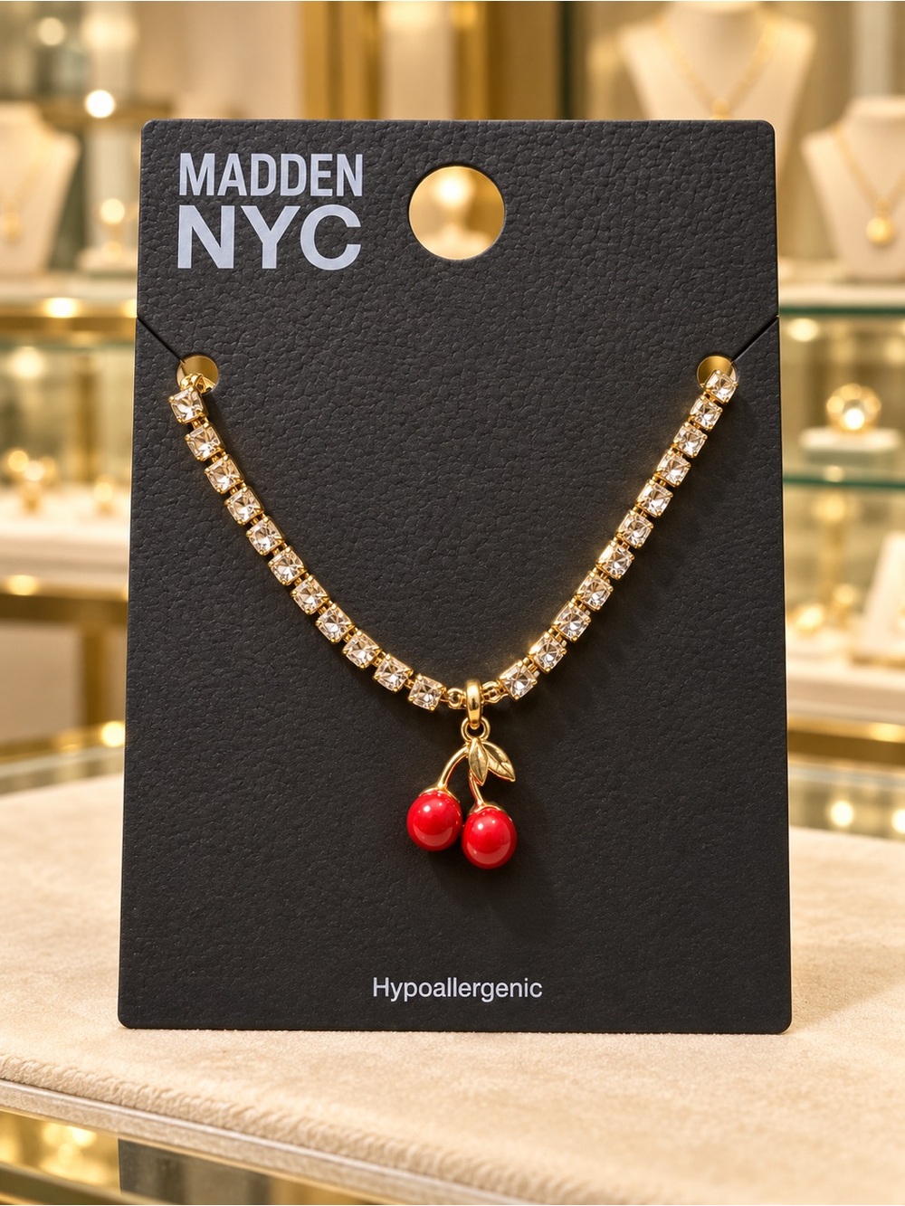 Madden NYC Gold Crystal Necklace with Red Cherry Charm